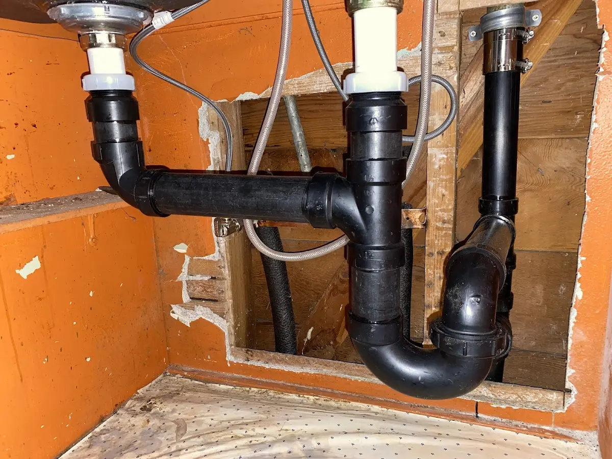 Professional Garbage Disposal Repair equipment and tools on the job in Jerome